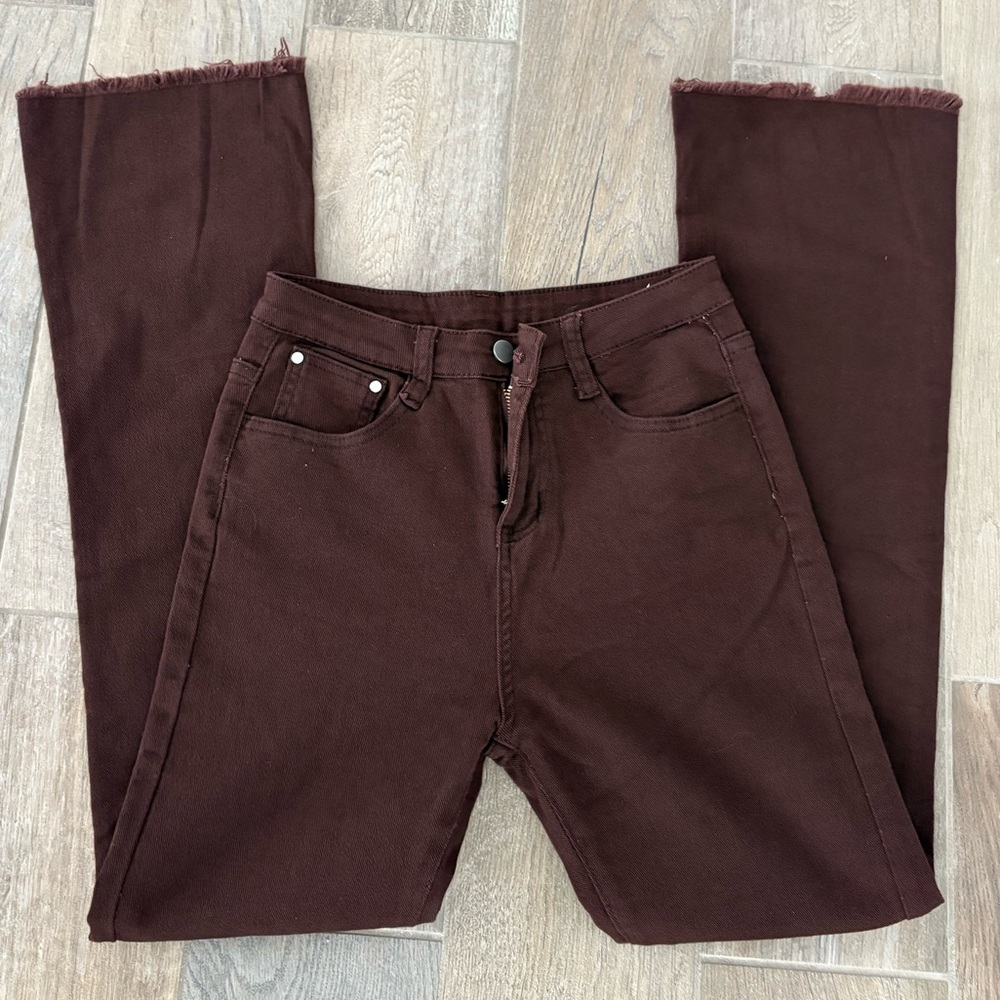 Brown high-waisted straight-leg jeans with raw hem jeans